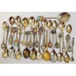 Decorative white metal and silver plated spoons