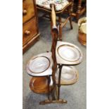 A four tier oak folding cake stand