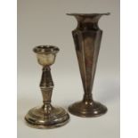 A silver specimen vase and a silver candlestick