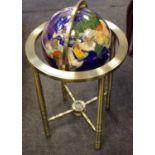 A floor standing gemstone globe 87cm high