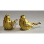 A pair of Royal Crown Derby paperweights, Canaries, gold stoppers,