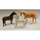 A Beswick horse model, New Forest; another,
