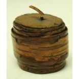 A 19th century continental snuff barrel formed from wrapped beech bark, plugged cover.