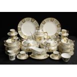 A Royal Crown Derby Green Derby Panel dinner and coffee service for eight comprising dinner plates,