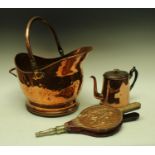 A copper coal scuttle; a pair of bellows;