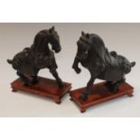 Chinese School - a pair of dark patinated bronze equestrian library desk models, after the Tang,
