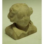 A Continental alabaster carving, of a female head, 12.