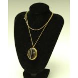 A Victorian agate locket on chain