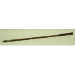A Spanish makila walking stick, horn knop handle, wooden grip and shaft,