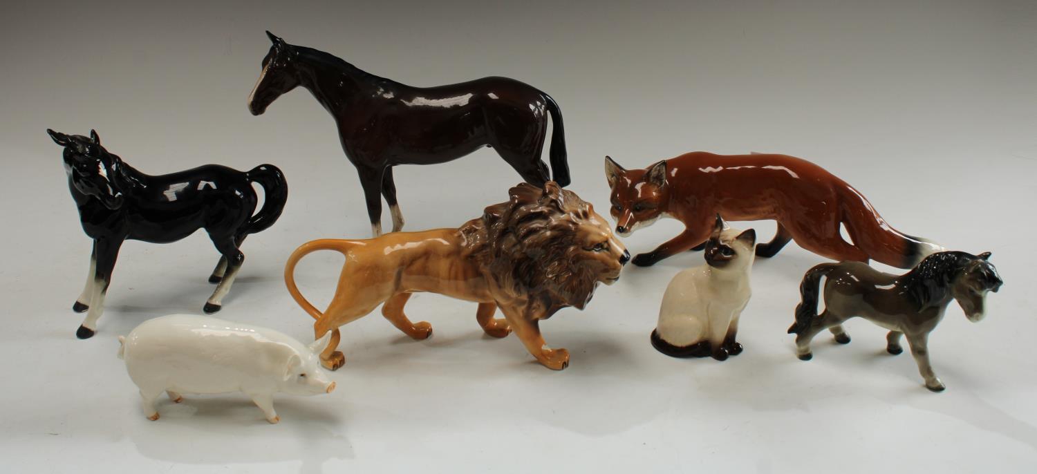 A Beswick model of a lion; other animal models, fox, Beswick pig Ch.