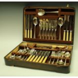 A canteen containing EPNS and other flatware, fitted oak case,
