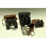 A Swift Saratoga, 8 x 40 binocular, cased; anotehr pair,