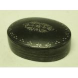 An Indian Bidri oval box and cover, inlaid with silver,