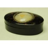 A 19th century tortoiseshell oval snuff box, push-fitting cover,