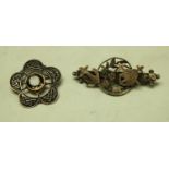 A silver Celtic stone set brooch;