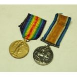 Medals, World War I, a pair, British War and Victory, named to T-4 180084 Dvr.