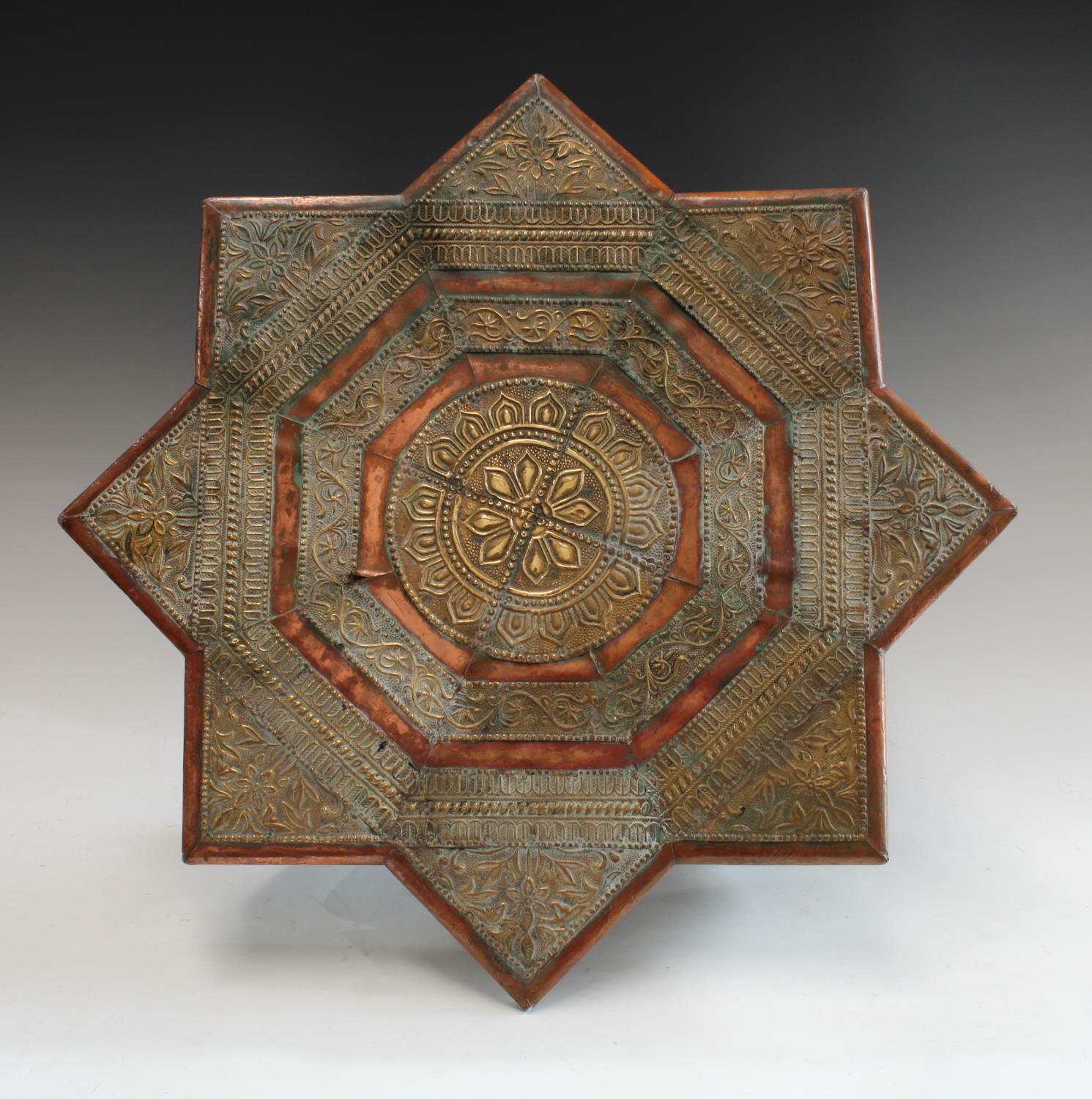 An Indian embossed metal mounted Bajot/opium tea table, 18cm high, 50cm wide, - Image 3 of 3