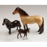 A Beswick model horse, Highland; another,
