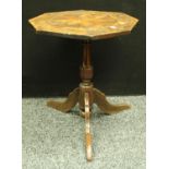 An ‘18th century’ elm and fruitwood octagonal occasional table, the top inlaid with a starburst,