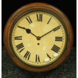 An oak circular school wall clock, Roman numerals,