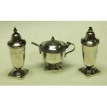 A silver three piece condiment set, Sheffield hallmarks,