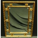 A contemporary giltwood looking glass,