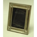An Elizabeth II silver easel photograph frame,