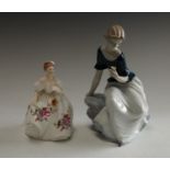 A Spanish porcelain Nao figure, Girl with a Rose, 30cm, printed mark; a Royal Doulton figure,