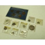 Collectable UK and foreign coins including: UK plastic case containing pennies from Heaton and