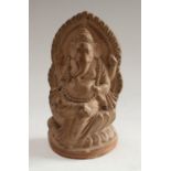 An Indian terracotta murti, modelled as Ganesha, painted features, 15.