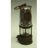 A brass based miner's lamp, Protector Lamp and Lighting Co,