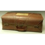 A mid 20th century travelling trunk/case, bearing label for Furness Line,