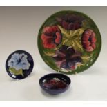 A Moorcroft Anemone pattern plate, 26cm diameter; an Anemone pattern circular dish, 11.