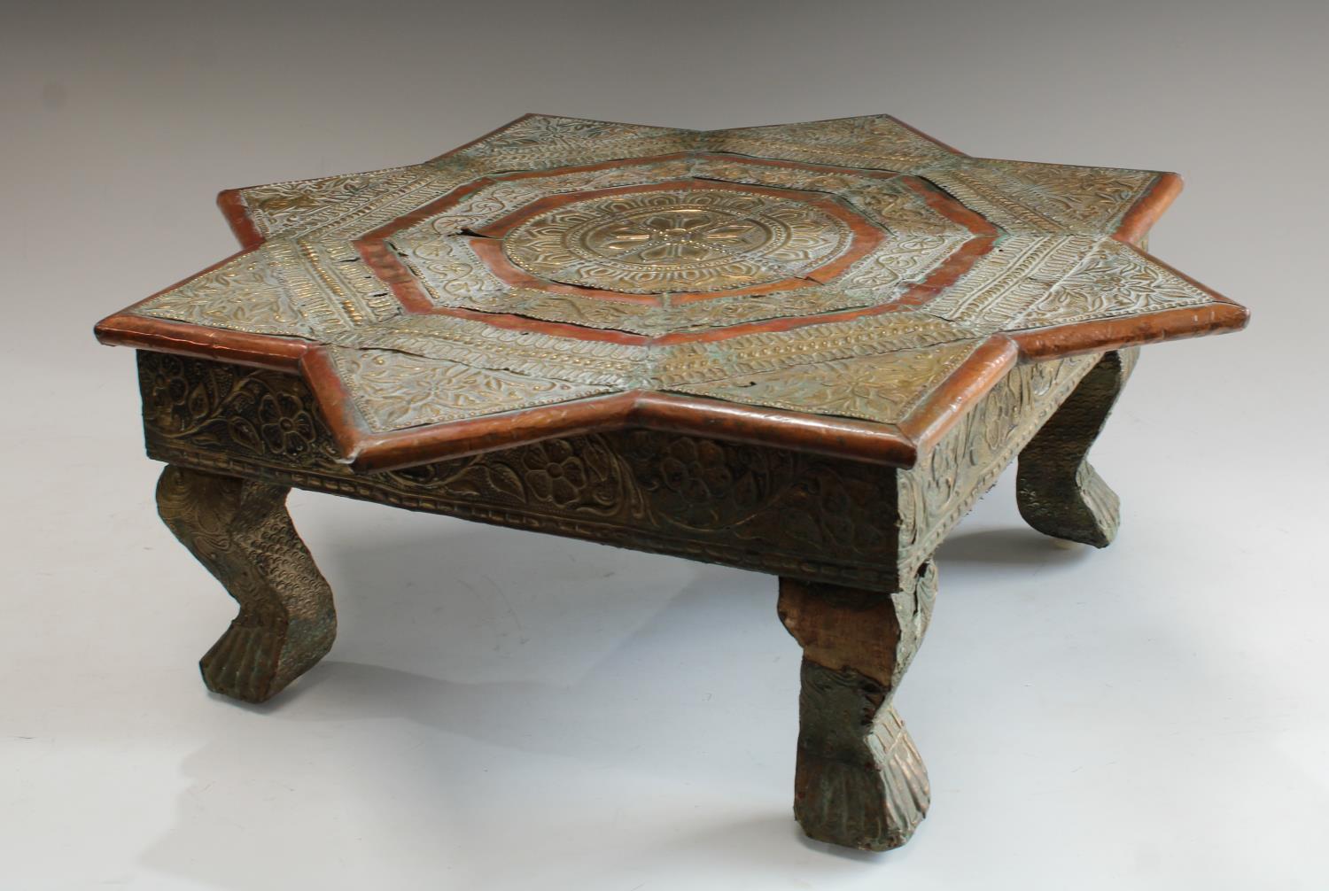 An Indian embossed metal mounted Bajot/opium tea table, 18cm high, 50cm wide, - Image 2 of 3