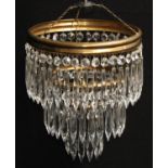 A 20th century French three-tier electrolier shade, multi-faceted glass drops,
