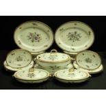 A Spode Copeland's dinner service, printed with ribbon tied floral sprays and butterflies,