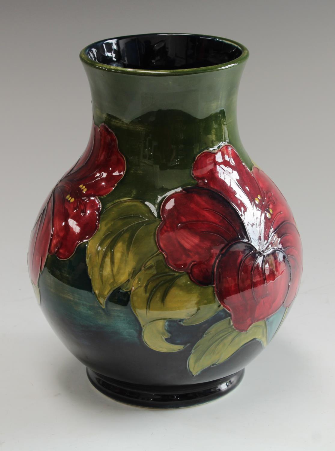 A Moorcroft Hibiscus pattern vase, signed Walter Moorcroft,