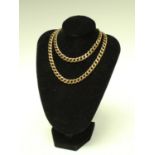 A 9ct gold curb link necklace, the clasp marked 375, 58.
