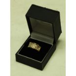 An 18ct gold diamond ring, chanel set in bands, 7.
