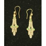 A pair of 9ct gold drop earrings, set with seed pearls and peridot, 4cm,