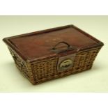 An early 20th century tooled moroccco leather and wicker work box