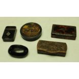 Snuff boxes - a George III rounded rectangular tolewear snuff box; another, ebonised and oval,