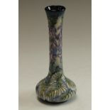 A contemporary Moorcroft bottle vase, designed by Rachel Bishop, signed, dated 2002, 20cm,