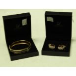 A Swarovski crystal bangle and clip earring part suite,