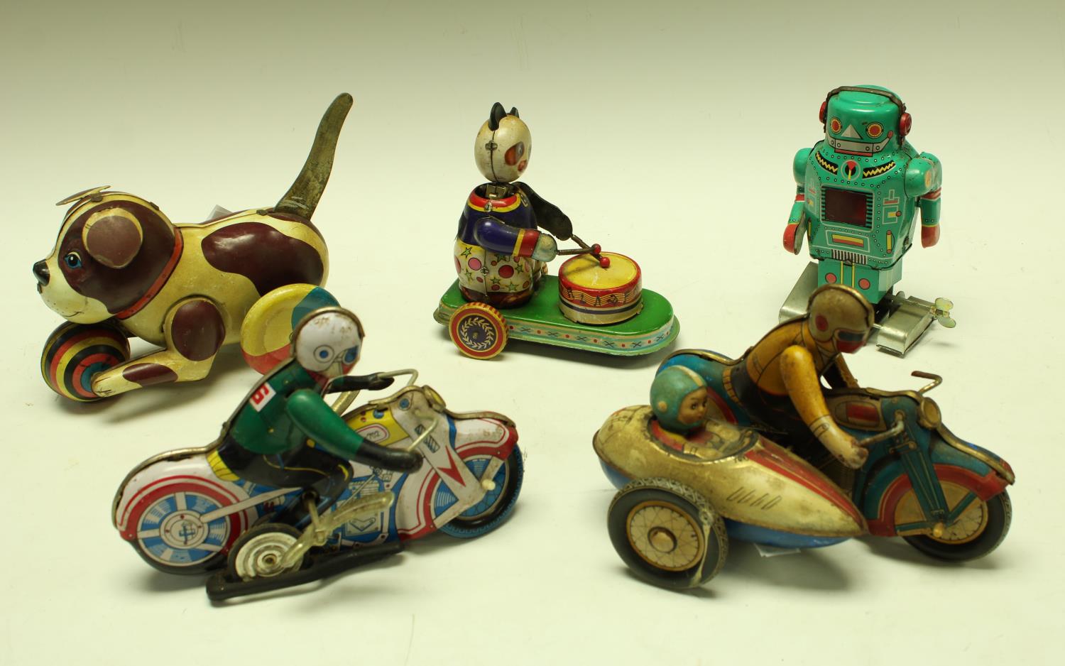 A Chinese tin-plate model motorcycle and side car; another similar; other tin plate models,