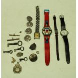 A Swatch wristwatch,
