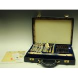 A set of Solingen SBS Bestecke gold plated flatware, stainless steel blades, complete,