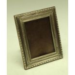 An Elizabeth II silver rectangular easel photograph frame,