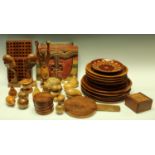 Treen - a set of six hardwood platters, 30cm diameter; another set,