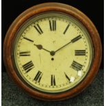 An oak circular school clock, Roman numerals,